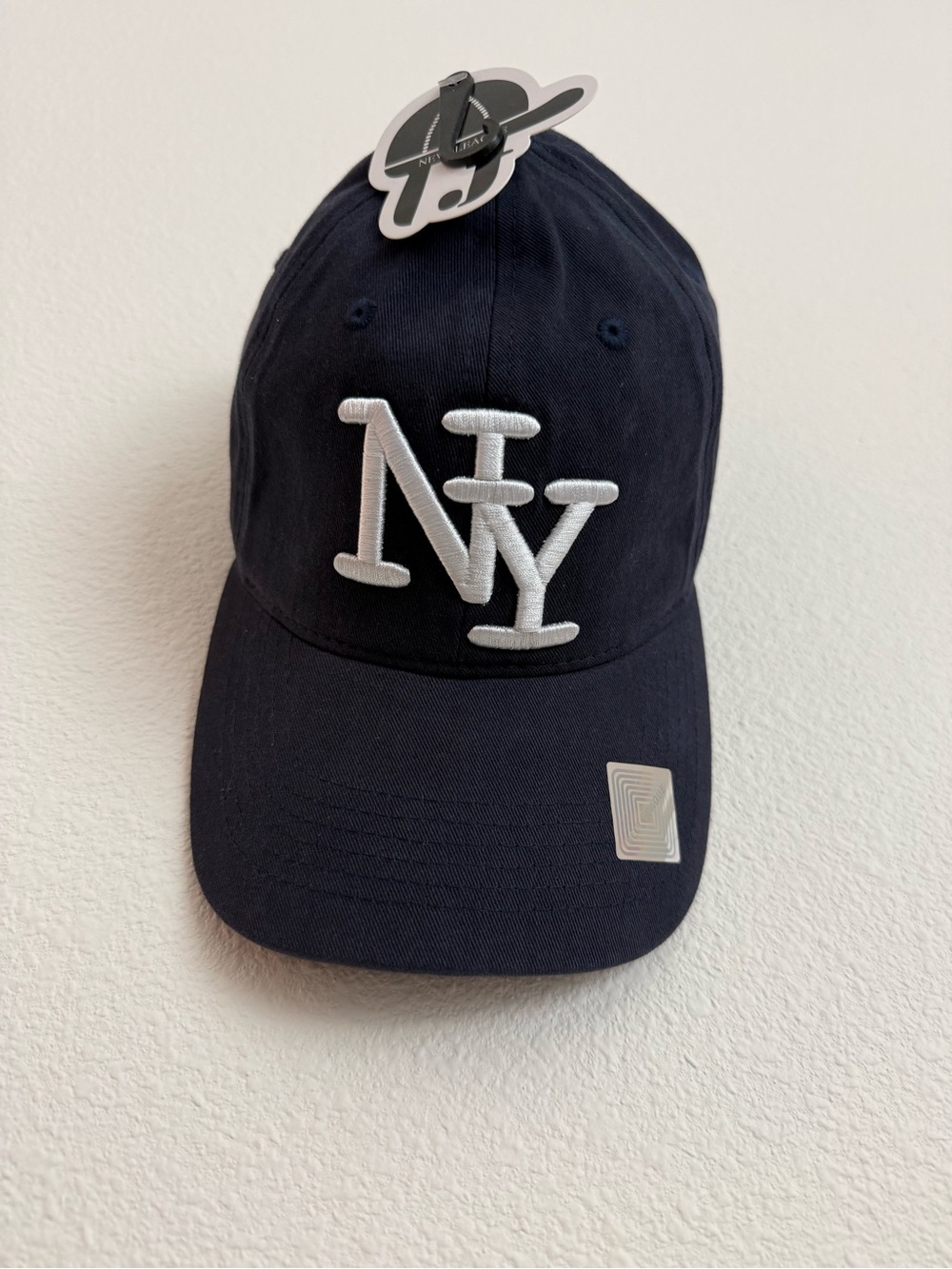 Navy Baseball Cap with White 'NY' Embroidery